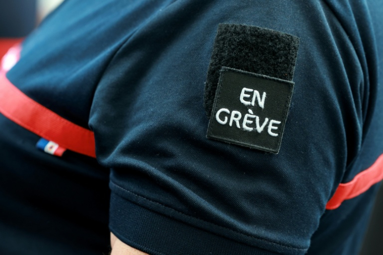 Plus de 20 ans après la dernière loi de modernisation, les pompiers attendaient beaucoup du texte né du Beauvau ( AFP / Kenzo TRIBOUILLARD )