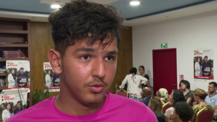 Cette capture vidéo, réalisée le 14 novembre 2025 à partir d'images de l'AFP datées du 7 juillet 2024, montre Mehdi Kessaci, frère d'Amine Kessaci ( AFP / Jeremy MARTIN )