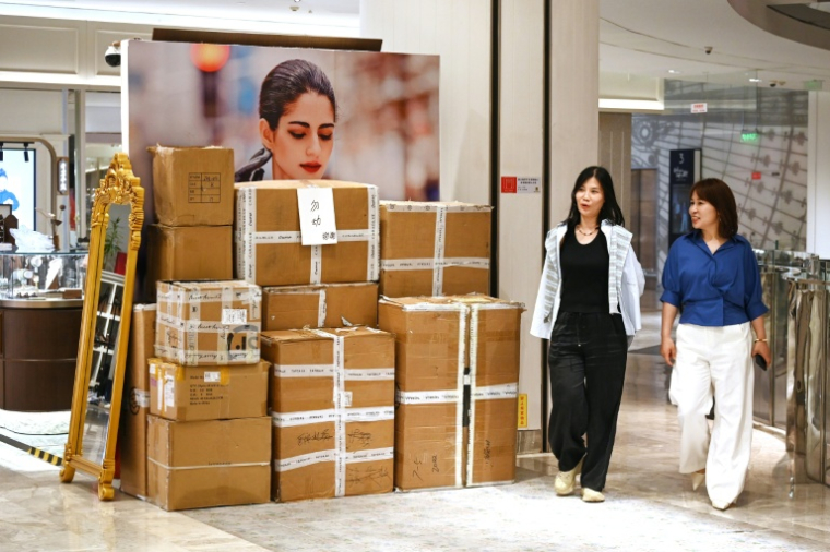 Au sein des Galeries Lafayette à Pékin le 26 mai 2026, la veille de la fermeture  ( AFP / GREG BAKER )