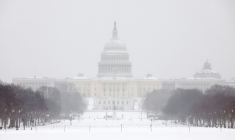 Le Capitole de Washington, siège du Congrès américain, sous la neige le 25 janvier 2026 ( AFP / Amid FARAHI )
