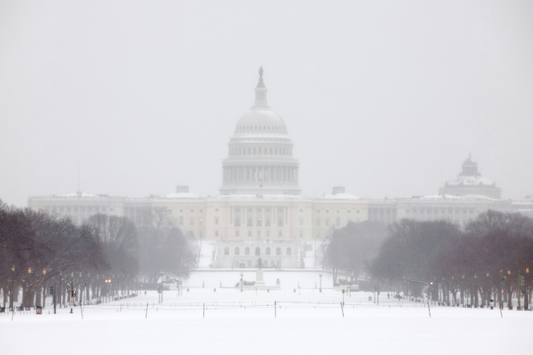 Le Capitole, siège du Congrès américain, sous la neige, à Washington, le 25 janvier 2026 ( AFP / Amid FARAHI )