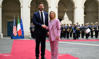Italy's Prime Minister, Giorgia Meloni welcomes U.S. Vice President JD Vance at Palazzo Chigi prior their meeting in Rome on April 18, 2025. ( POOL / Kenny HOLSTON )