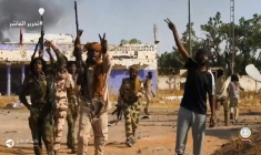 Capture d'écran d'une vidéo diffusée le 26 octobre 2025 sur le compte Telegram des Forces de soutien rapide (FSR), montre des combattants des FSR célébrant dans une rue d'El-Facher, au Darfour, dans l'ouest du Soudan ( Rapid Support Forces (RSF) / - )