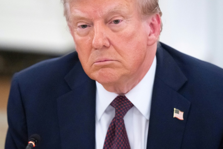 Le président américain Donald Trump participe à un dîner dans la salle à manger d'Etat de la Maison Blanche à Washington, le 4 septembre 2025 ( AFP / SAUL LOEB )