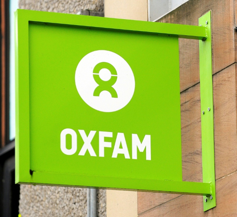 Le logo d'Oxfam, à Glasgow, le 10 février 2018 ( AFP / Andy Buchanan )