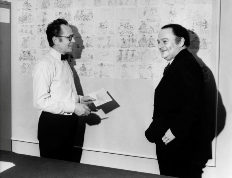 René Goscinny, à droite, discute avec Morris, à gauche, à Bruxelles en décembre 1971 ( AFP / - )