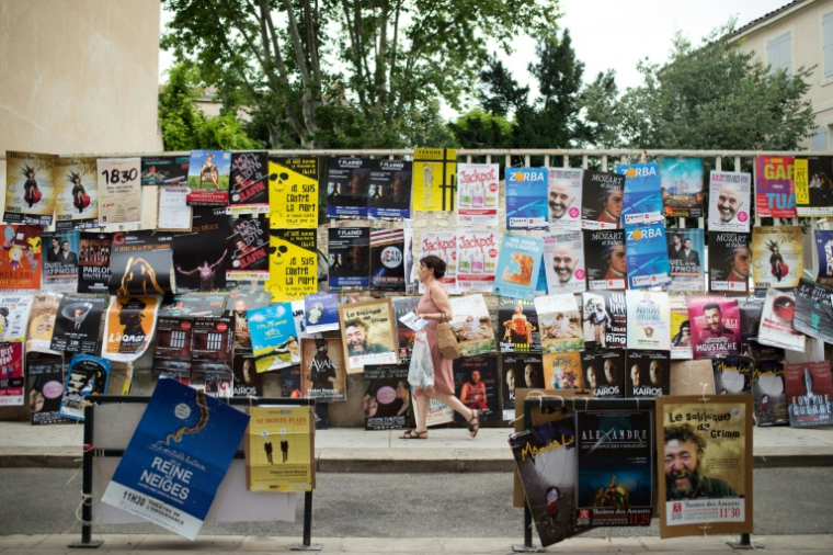 Les affiches des différents spectacles du festival Off d'Avignon, le 5 juillet 2016, à Avignon, dans le Vaucluse ( AFP / BERTRAND LANGLOIS )