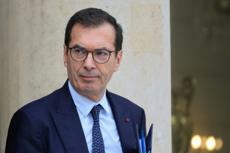 Le ministre du Travail Jean-Pierre Farandou à la sortie de l'Elysée, le 14 octobre 2026 à Paris ( AFP / Ludovic MARIN )