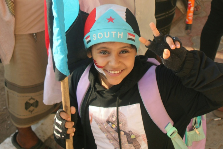 Un enfant yéménite lors d'une manifestation des partisans du Conseil de transition du Sud (STC) en faveur d'une "seconde indépendance", du Yémen du Sud, à Aden le 8 décembre 2025 ( AFP / Handout )