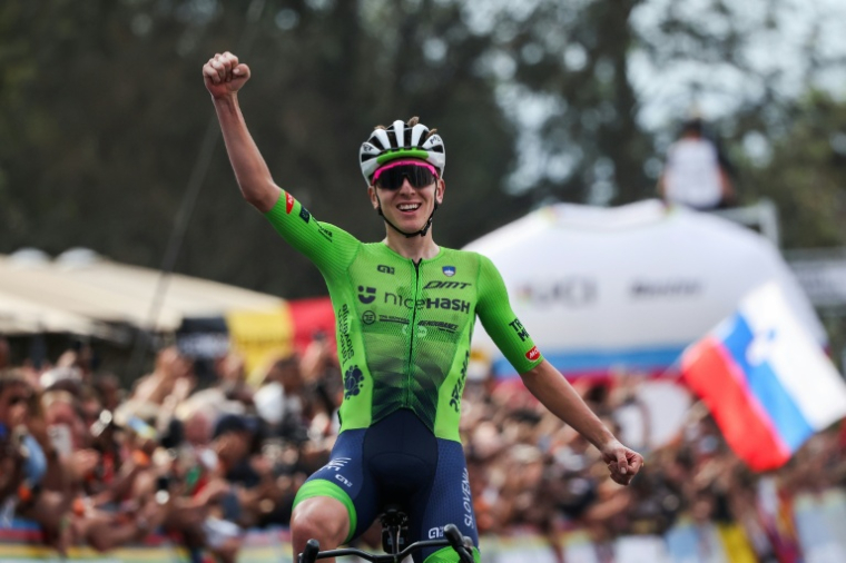 Le Slovène Tadej Pogacar, à nouveau sacré champion du monde, le 28 septembre 2025 à Kigali au Rwanda ( AFP / Anne-Christine POUJOULAT )
