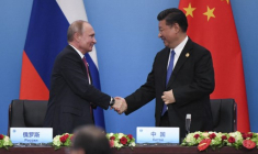 Xi Jinping et Vladimir Poutine à Qingdao, en Chine, le 10 juin 2018. ( AFP / WANG ZHAO )