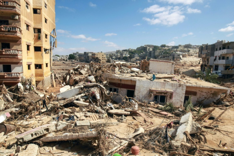 Les décombres des bâtiments effondrés après le passage de la tempête qui a frappé la ville de Derna, dans l'est de la Libye, le 14 septembre 2023 ( AFP / Abdullah DOMA )