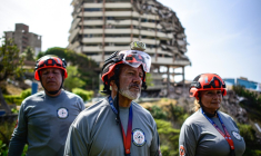 Des membres du Groupe de sauvetage unifié du Venezuela (GRUV) à Catia La Mar, au Venezuela, le 4 août 2026 ( AFP / Maxwell BRICENO )