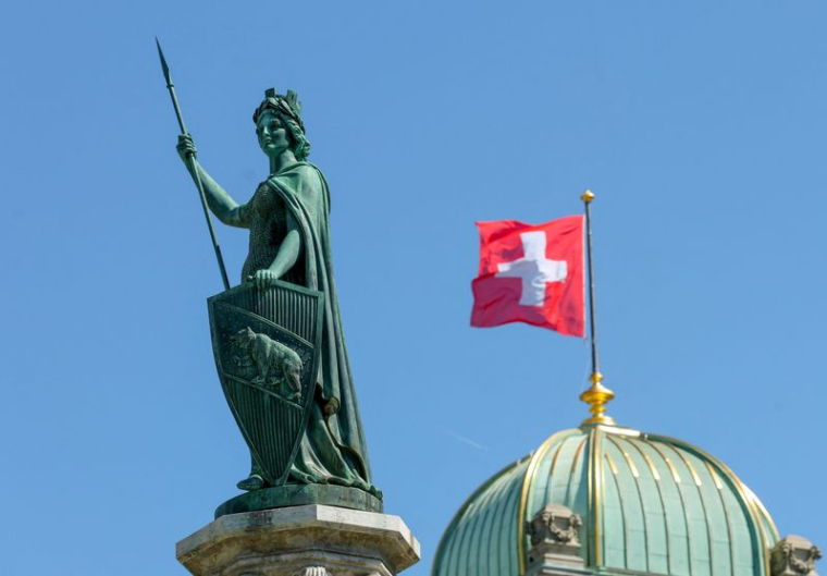 La statue de l'Helvétie est représentée sur le bâtiment du Parlement suisse à Berne