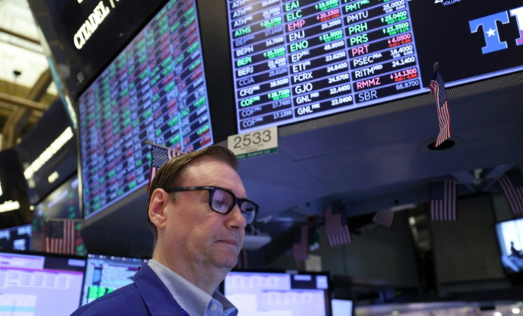 Un opérateur à la Bourse de New York, le 18 juin 2025 ( AFP / TIMOTHY A. CLARY )
