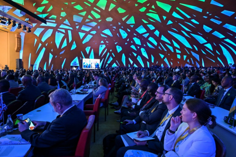 Des participants aux réunions annuelles de la Banque africaine de développement (BAD), le 27 mai 2025 à Abidjan, en Côte d'Ivoire ( AFP / Issouf SANOGO )