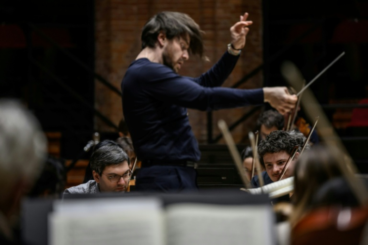 Des musiciens de l'orchestre de Toulouse lors d'une répétition à laquelle assistent des patients psychiatriques à Toulouse, le 10 février 2026 ( AFP / Ed JONES )