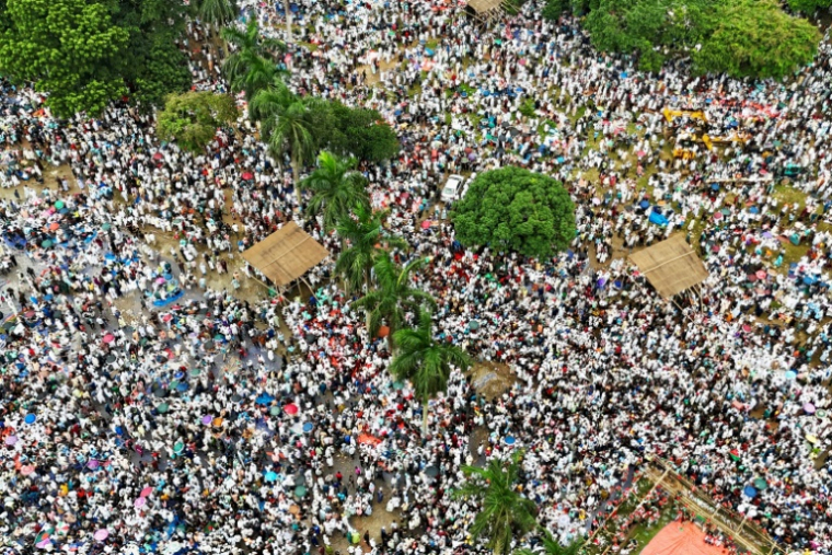 Des dizaines de milliers de partisans du principal parti islamiste du Bangladesh, le Jamaat-e-Islami, rassemblés à Dacca pour réclamer notamment la représentation proportionnelle au Parlement à quelques mois des élections, le 19 juillet 2025 ( AFP / MUNIR UZ ZAMAN )