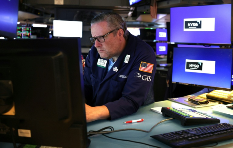 Un opérateur à la Bourse de New York le 17 août 2026 ( AFP / TIMOTHY A. CLARY )
