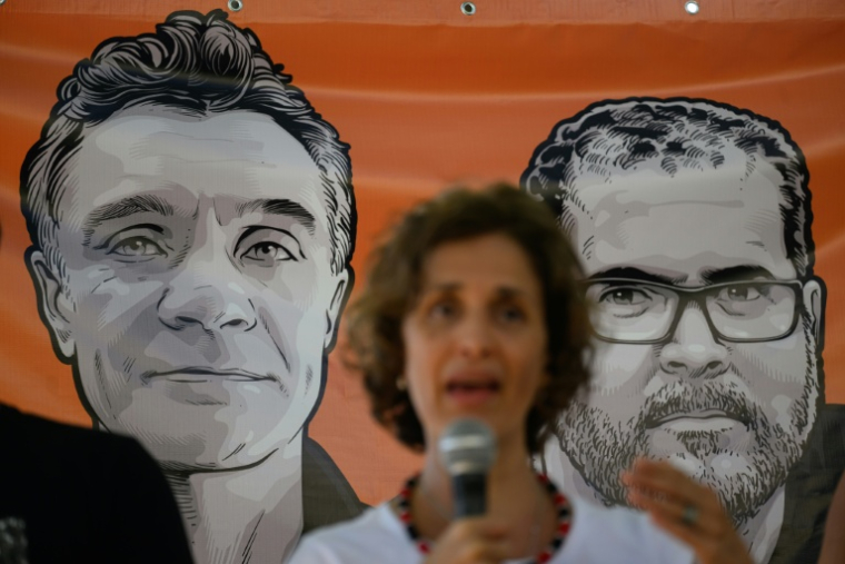 Alessandra Sampaio, veuve du journaliste britannique Dom Phillips, s'exprime lors d'un rassemblement le 5 juin 2023 à Rio en hommage à son mari et à l'expert brésilien Bruno Pereira, assassinés en 2022 en Amazonie ( AFP / MAURO PIMENTEL )