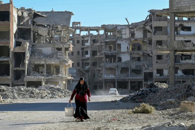 Dans un quartier détruit de Daraya, le 29 octobre 2025 ( AFP / LOUAI BESHARA )