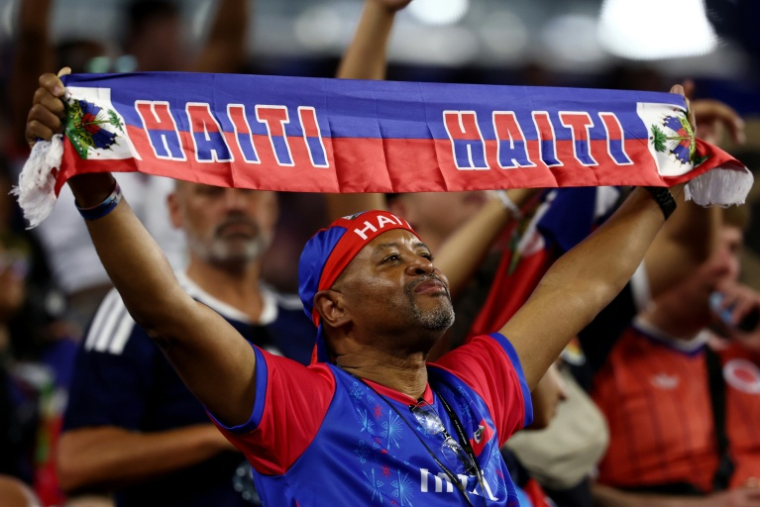 Un supporteur de l'équipe d'Haïti lors du match contre l'Ecosse au Boston Stadium de Foxborough, le 13 juin 2026 ( AFP / FRANCK FIFE )