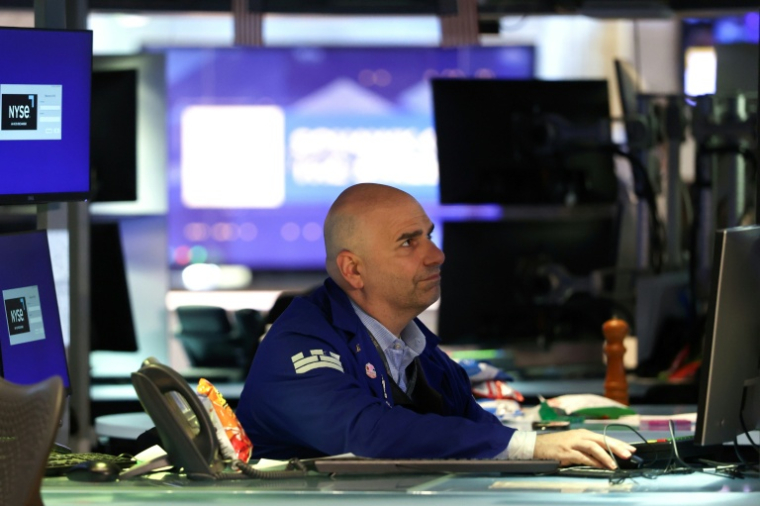 Un opérateur à la Bourse de New York, le 14 mai 2026 ( AFP / TIMOTHY A. CLARY )