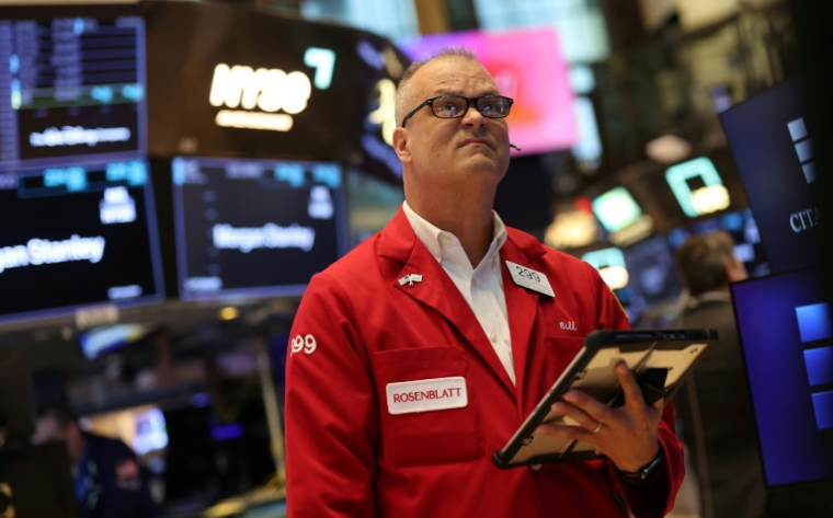 Un opérateur à la Bourse de New York, le 14 juillet 2026 ( AFP / TIMOTHY A. CLARY )