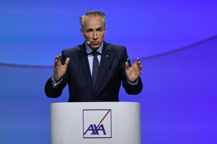 Thomas Buberl, PDG d'Axa, lors de l'assemblée générale de la multinationale française d'assurances à Paris, le 30 avril 2026 ( AFP / Anne-Christine POUJOULAT )