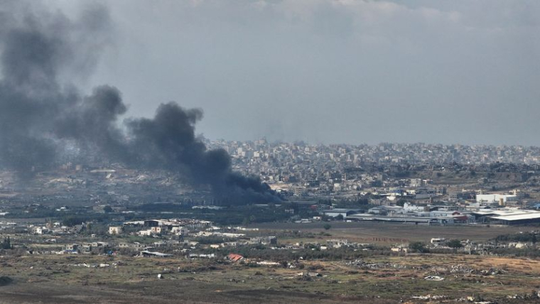 A drone view shows smoke above Beit Hanoun in the Gaza Strip, as seen from near Kibbutz Nir Am in southern Israel