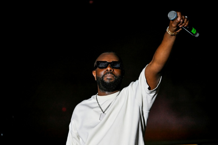 Le rappeur Gims en concert à Abidjan, le 17 mai 2024 en Côte d'Ivoire  ( AFP / Sia KAMBOU )