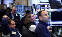 Des tradeurs à l'oeuvre à la Bourse de New York le 8 avril 2026. ( AFP / CHARLY TRIBALLEAU )