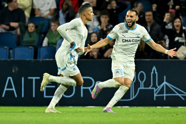 Amine Gouiri célèbre son but contre le Havre samedi lors de la 33e journée de Ligue 1. ( AFP / Lou BENOIST )