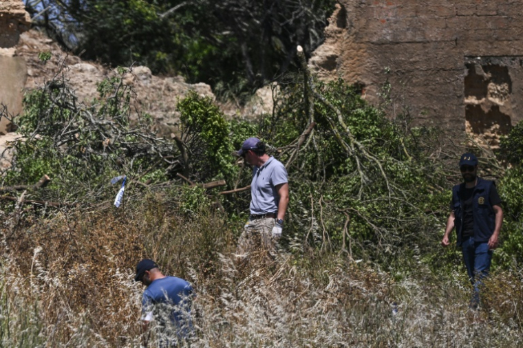 Police investigators search for clues into the disappearance of Madeleine McCann on June 5, 2025 in southern Portugal ( AFP / Patricia DE MELO MOREIRA )