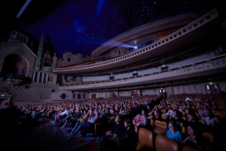 Des spectateurs au cinéma le Grand Rex à Paris le 12 mai 2025 ( AFP / Kiran RIDLEY )