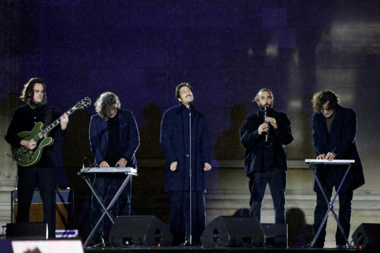 Le groupe français Feu! Chatterton se produit lors de la cérémonie d'entrée au Panthéon de Missak Manouchian et de son épouse Melinee, à Paris, le 21 février 2024 ( AFP / Ludovic MARIN )