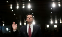 James Comey, ancien chef du FBI, prête serment devant le Sénat, à Washington DC, le 8 juin 2017 ( AFP / Brendan Smialowski )