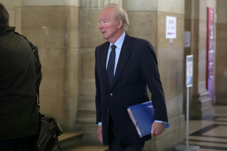 L'ancien ministre français de l'Intérieur, Brice Hortefeux, arrive au Palais de justice de Paris, le 11 mai 2026, pour le procès en appel dans l'affaire du financement libyen de la campagne présidentielle de Nicolas Sarkozy en 2007 ( AFP / Alain JOCARD )