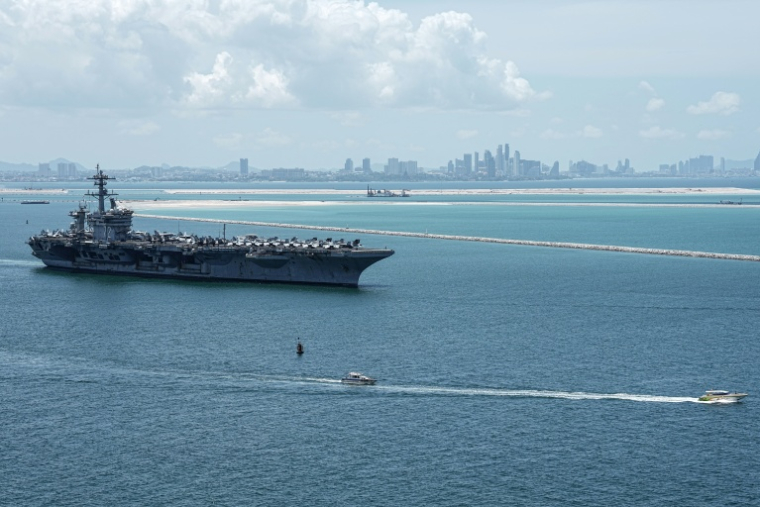 US nuclear-powered aircraft carrier USS Abraham Lincoln (CVN-72) departs Laem Chabang Port, near the city of Pattaya on September 6, 2026. Thousands of US sailors aboard an aircraft carrier departed from Thailand on September 6, AFP journalists said, concluding its first port call following reports of deteriorating living conditions on board after nine months at sea. ( AFP / Chanakarn LAOSARAKHAM )
