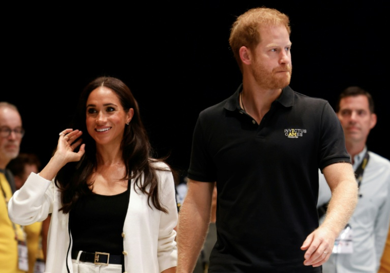 Meghan, duchesse de Sussex, et le prince Harry, duc de Sussex, arrivent aux Invictus Games 2023 à Düsseldorf, dans l'ouest de l'Allemagne, le 13 septembre 2023 ( AFP / Odd ANDERSEN )