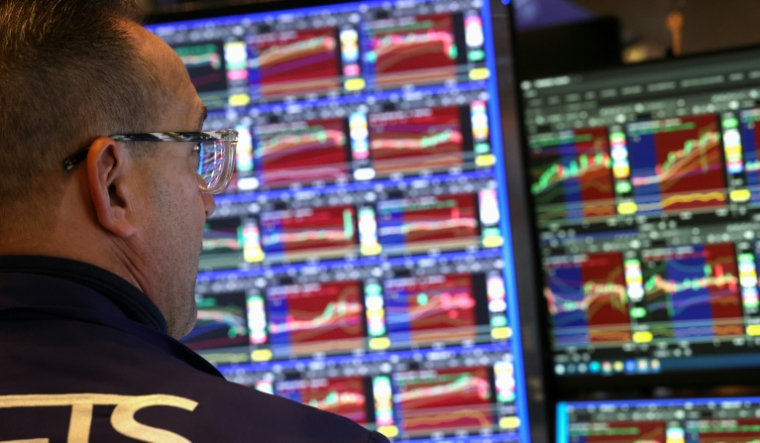 Un opérateur à la Bourse de New York, le 3 décembre 2025 ( AFP / TIMOTHY A. CLARY )