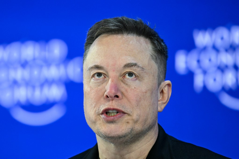 Elon Musk à Davos, en Suisse, le 23 janvier 2026. ( AFP / FABRICE COFFRINI )