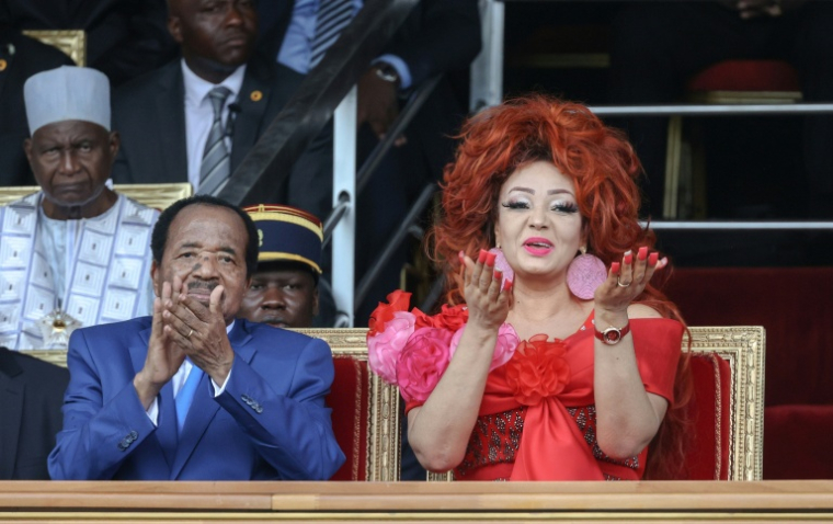 Le président camerounais Paul Biya et son épouse Chantal Biya, lors du défilé organisé à l'occasion de la 52e fête nationale, Yaoundé, le 20 mai 2024 ( AFP / - )