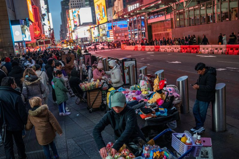 Des personnes à Times Square, à New York