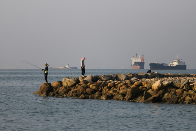 Des navires dans le détroit d'Ormuz face au port iranien de Bandar Abbas, le 8 juin 2026 ( ISNA / Amirhossein KHORGOOEI )