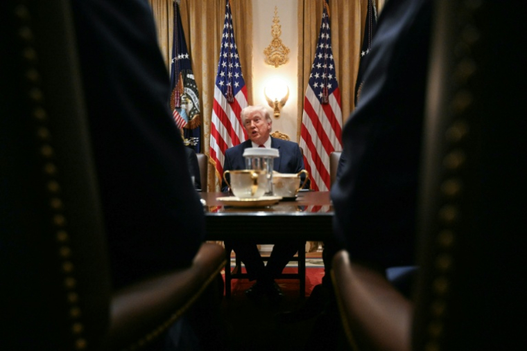 Le président américain Donald Trump lors d'une réunion de son cabinet à Washington le 26 mars 2026 ( AFP / Jim WATSON )