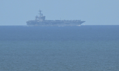 Vue du porte-avions américain Abraham Lincoln depuis le port de Laem Chabang en Thaïlande, le 2 septembre 2026 ( AFP / ANTHONY WALLACE )