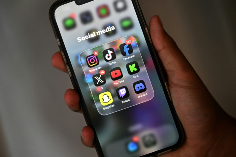 L'Australie interdit l'accès aux réseaux sociaux aux jeunes adolescents le 10 décembre 2025 ( AFP / Saeed KHAN )