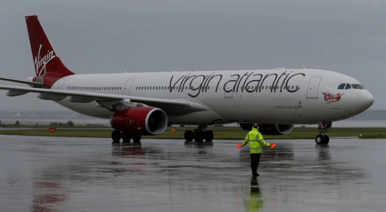 VIRGIN ATLANTIC NE SURVIVRA PAS SANS AIDE PUBLIQUE BRITANNIQUE, DIT BRANSON