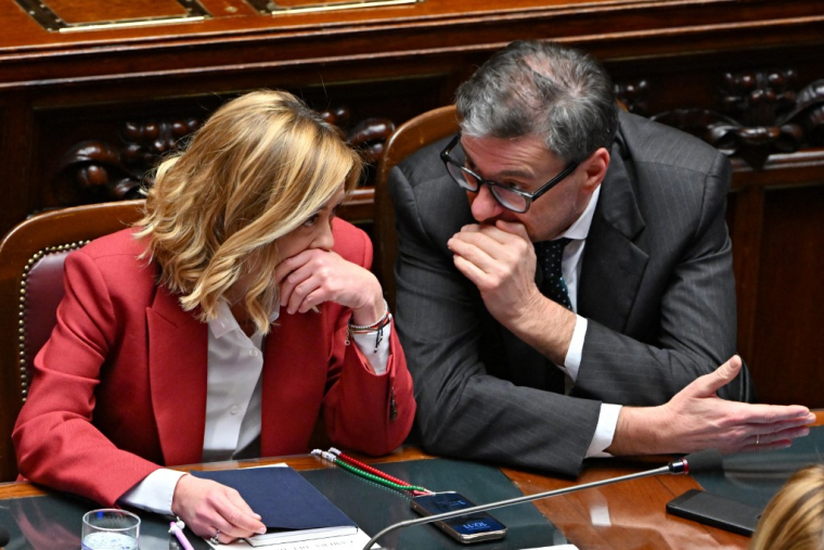 Giorgia Meloni et le ministre italien des Finances Giancarlo Giorgetti, en décembre 2024, à Rome ( AFP / ANDREAS SOLARO )